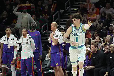 NBA 2024-25: Hornets guard LaMelo Ball (1) celebrates after his 3-point basket