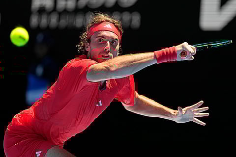 Australian Open 2025: Stefanos Tsitsipas plays a backhand return to Alex Michelsen
