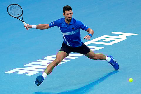 Australian Open 2025: Novak Djokovic plays a forehand return to Nishesh Basavareddy