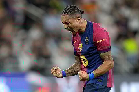 Spanish Super Cup 2025 Final: Barcelona's Raphinha reacts during match against Real Madrid