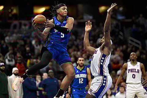 NBA 2024-25: Magic forward Paolo Banchero (5) looks to pass the ball