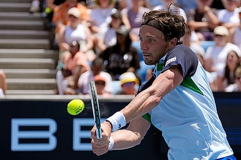 Australian Open 2025: Arthur Rinderknech plays a backhand return to Frances Tiafoe