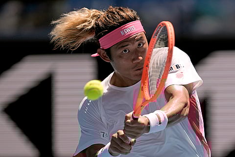 Australian Open 2025: Zhang Zhizhen plays a backhand return to Holger Rune