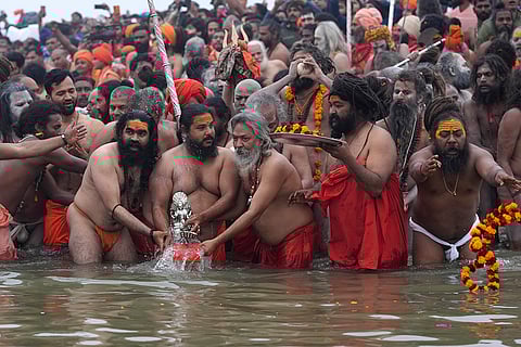 Naga Sadhus of Juna Akhara perform rituals at Sangam