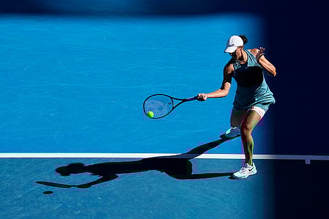 Australian Open 2025: Madison Keys plays a forehand return to Ann Li