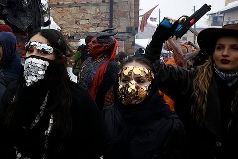 Masked revelers take part in Vevcani carnival