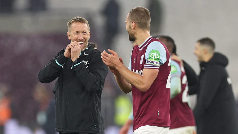 Graham Potter and Tomas Soucek celebrate West Ham's win - null