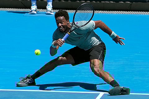 Australian Open 2025: Gael Monfils plays a forehand return to Giovanni Mpetshi Perricard