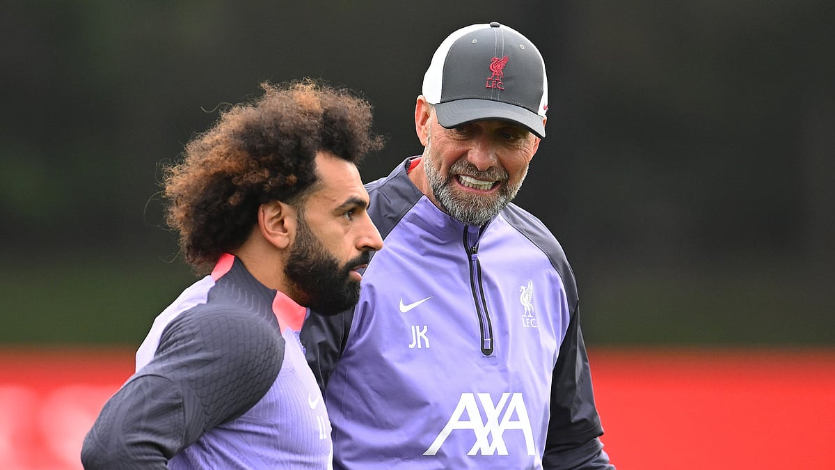Liverpool's Mohamed Salah with former manager Jurgen Klopp