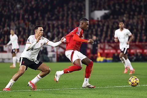 EPL 2024-25: Liverpool's Trent Alexander-Arnold duels for the ball with Nottingham Forest's Callum Hudson-Odoi