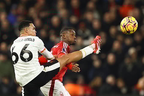 EPL 2024-25: Liverpool's Trent Alexander-Arnold duels for the ball with Nottingham Forest's Callum Hudson-Odoi