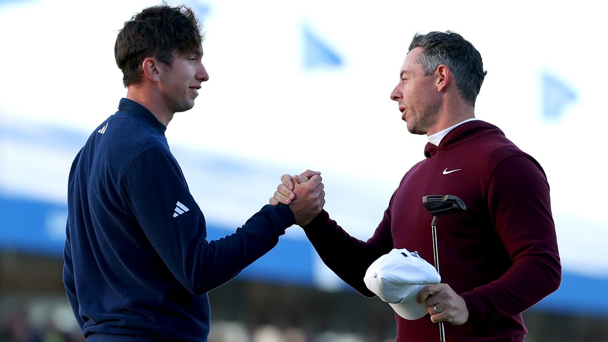 Tom McKibbin and Rory McIlroy