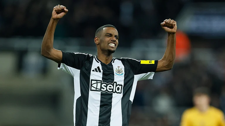Alexander Isak celebrates after scoring against Wolves - null