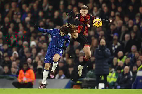 EPL 2024-25: Chelsea's Marc Cucurella challenges for the ball with Bournemouth's David Brooks