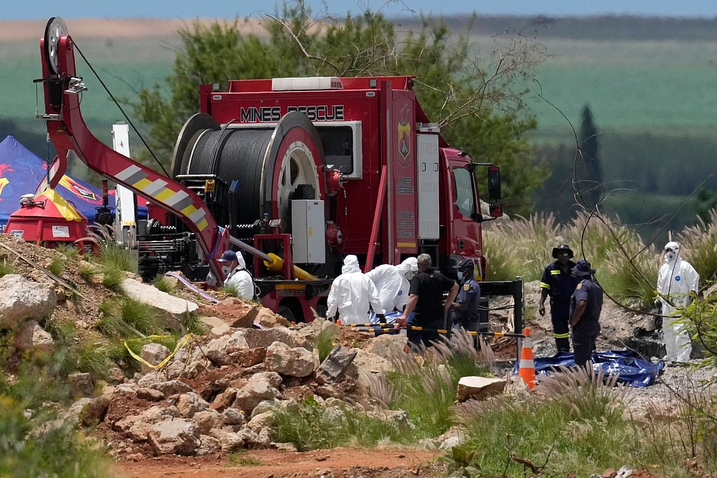 | Photo: AP : South Africa Under Fire For Crackdown On Illegal Miners By Cutting Food, Water Supply; 78 Dead 