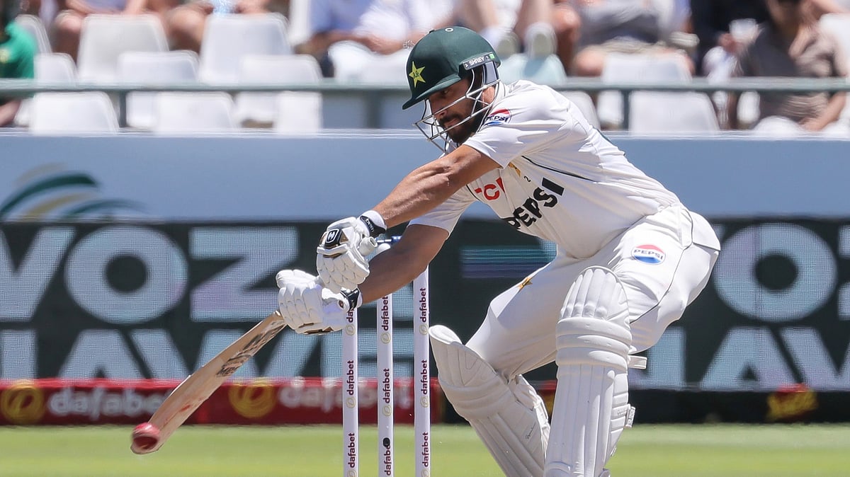 AP Photo/Halden Krog : Pakistan's Salman Agha plays a shot during the fourth day of the second test match between South Africa and Pakistan in Cape Town.