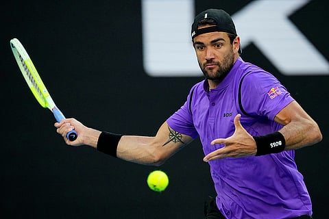 Australian Open 2025: Matteo Berrettini plays a forehand return to Holger Rune