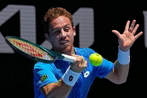 Australian Open 2025: Roberto Carballes Baena plays a forehand return to Tommy Paul