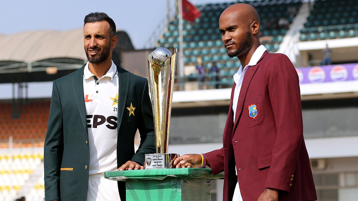 Asim Tanveer/AP : West Indies captain Kraigg Brathwaite, right, and his Pakistani counterpart Shan Masood pose for photo with test-series trophy, in Multan, Pakistan, Thursday, Jan. 16, 2025.