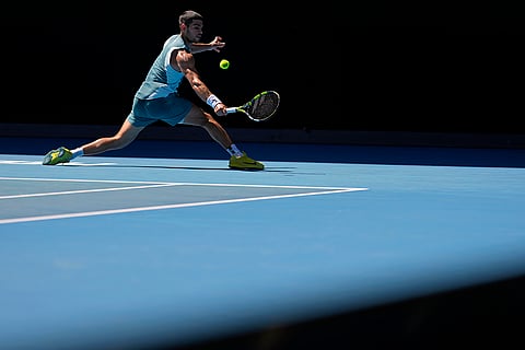 Australian Open 2025: Carlos Alcaraz plays a backhand return to Nuno Borges