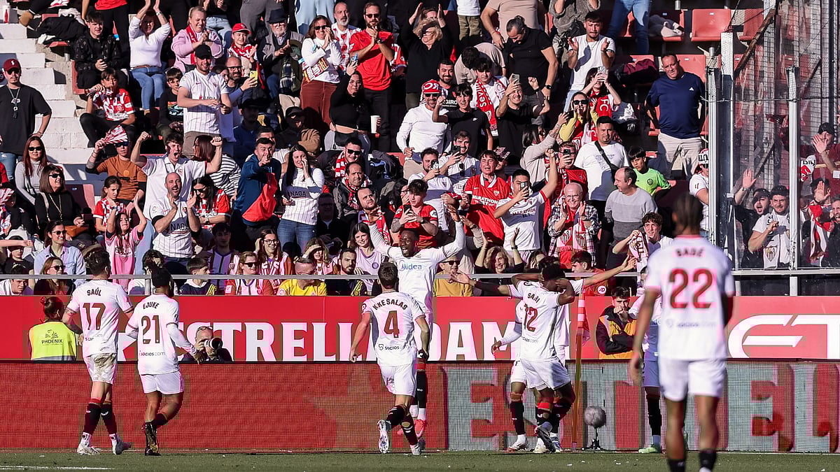 Sevilla celebrate Lukebakio's winner - null