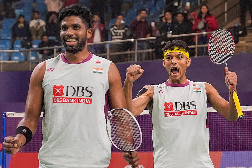| Photo: PTI/Gurinder Osan : BWF India Open 2025: India's Satwiksairaj Rankireddy and Chirag Shetty celebrate after winning the men's doubles quarterfinal