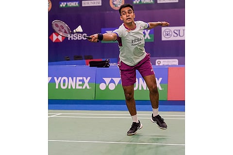 BWF India Open 2025: India's Kiran George returns a shot against China’s Hong Yang Weng