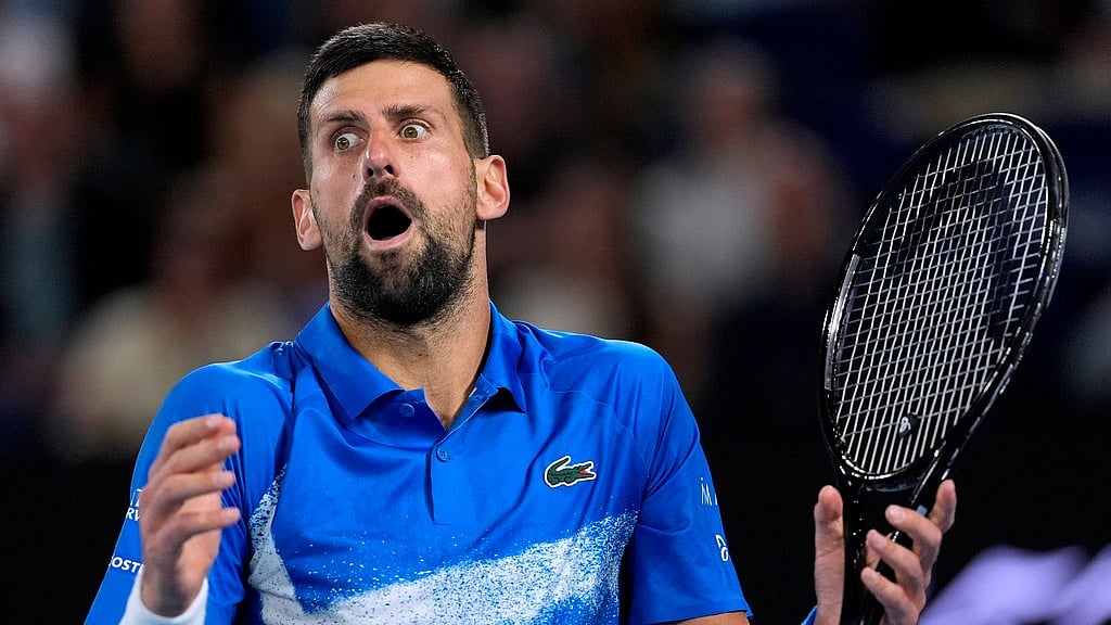AP/Asanka Brendon Ratnayake : Novak Djokovic in action at the Australian Open.