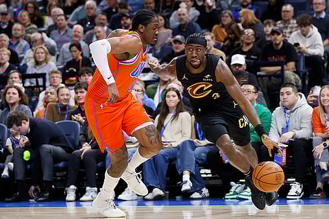 NBA 2024-25: Cavaliers guard Caris LeVert drives against Thunder forward Jalen Williams