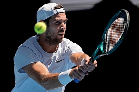 Australian Open 2025: Karen Khachanov plays a backhand return to Alex Michelsen