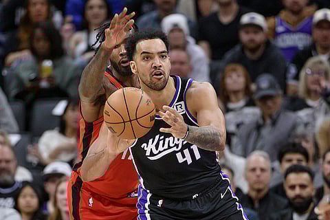 NBA 2024-25: Kings forward Trey Lyles (41) is guarded by Rockets forward Tari Eason
