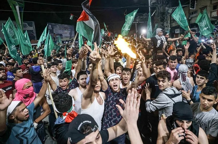 Gazan people celebrate as Israel cabinet approves ceasefire deal