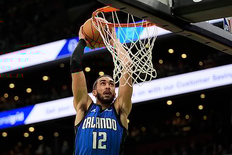 NBA 2024-25: Magic's Trevelin Queen dunks against the Celtics