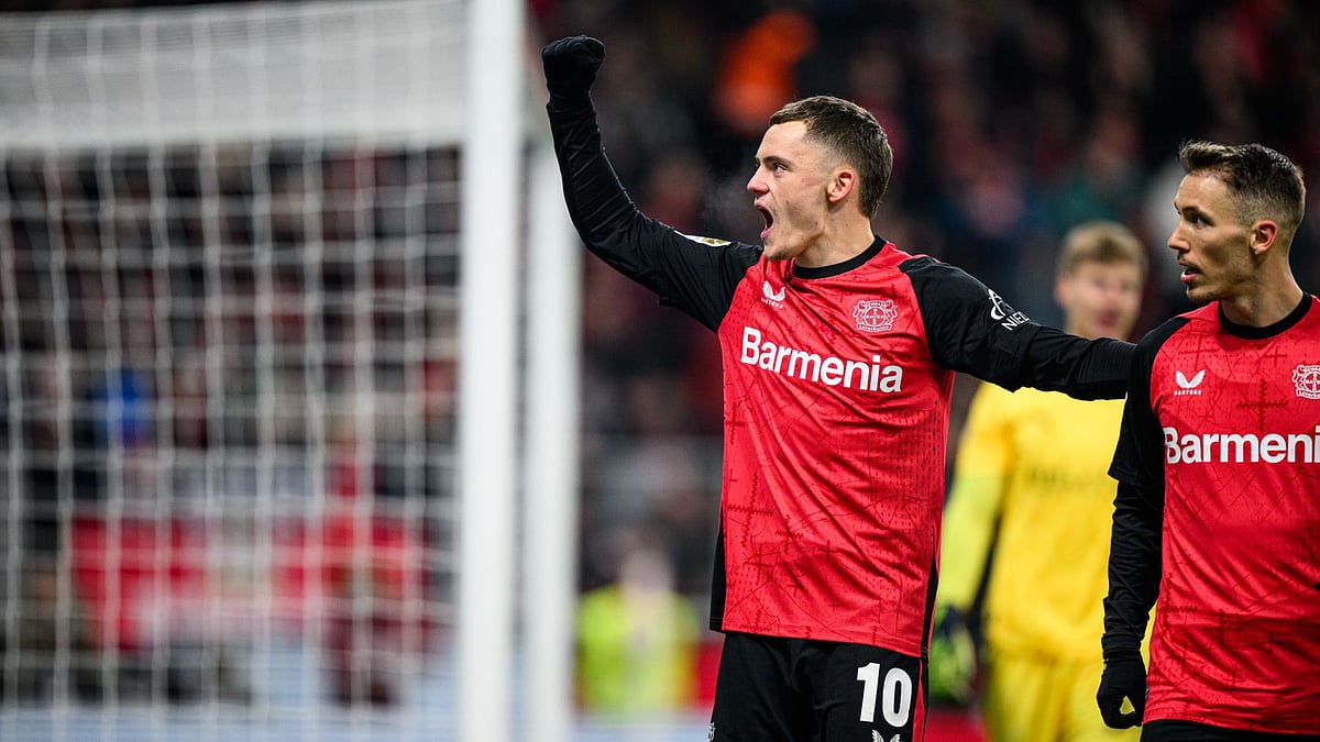 Florian Wirtz celebrates after scoring Leverkusen's second goal