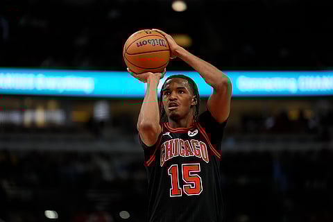 NBA 2024-25: Bulls forward Julian Phillips takes a free throw