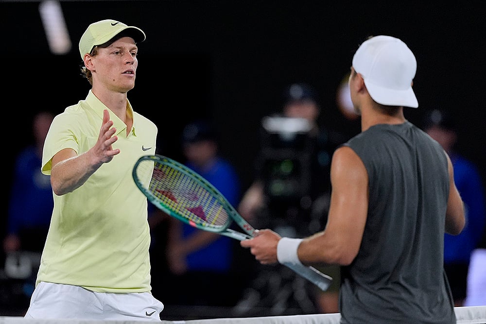 | Photo: AP/Asanka Brendon Ratnayake : Australian Open 2025: Jannik Sinner shakes hands with Marcos Giron