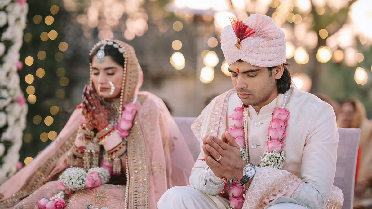 X/Neeraj Chopra : Neeraj Chopra with his wife Himani.