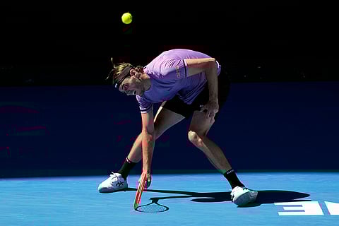 Australian Open 2025: Taylor Fritz plays a forehand return to Gael Monfils