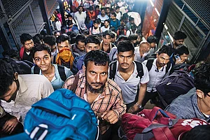 | Photo: Vikram Sharma : Riding on Hope: Migrant labourers from Bihar arriving at New Delhi station via the Sampark Kranti Express