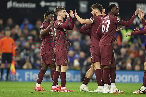 EPL 2024-25: James McAtee is congratulated after scoring his side's 6th goal
