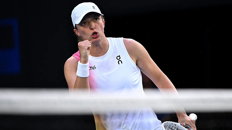 Iga Swiatek is into the Australian Open quarter-finals. - null