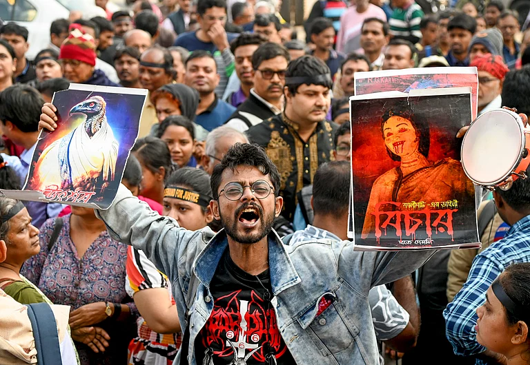 A member of 'Abhaya Mancha' during a protest as Sanjay Roy, accused in the alleged rape and murder of an on-duty doctor at R G Kar Medical College and Hospital, is produced at a Kolkata court on the day of the verdict, in Kolkata, Saturday, Jan. 18, 2025. - PTI
