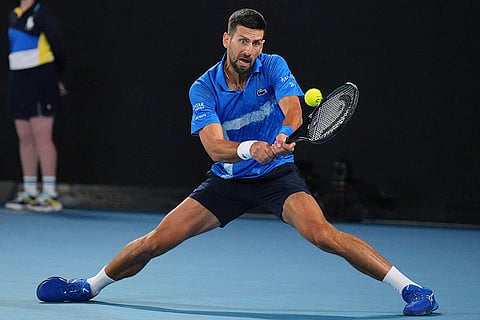 Australian Open 2025: Novak Djokovic plays a backhand return to Carlos Alcaraz