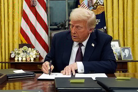 Donald Trump signs an executive order
