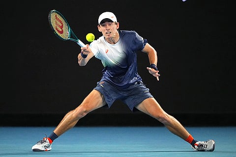 Australian Open 2025: Alex de Minaur plays a forehand return to Alex Michelsen