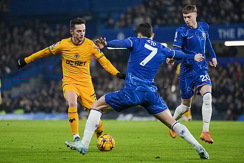 EPL 2024-25: Wolves Pablo Sarabia duels for the ball with Chelsea's Pedro Neto