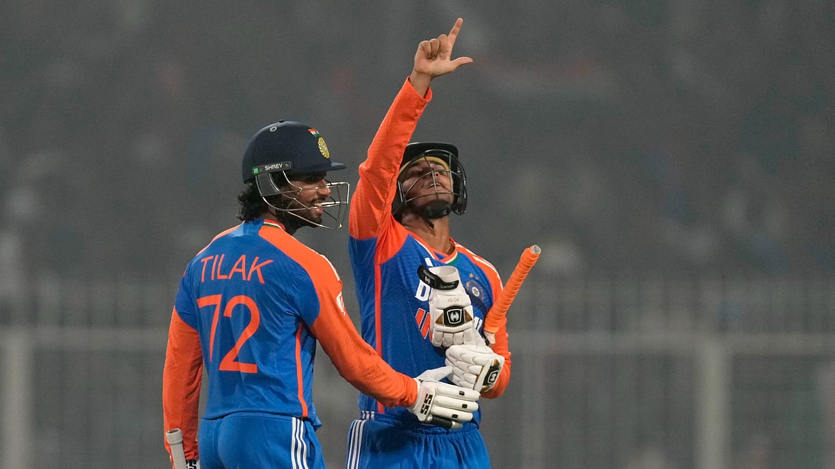 Indias Abhishek Sharma, right, celebrates after scoring fifty. AP Photo
