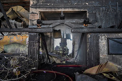 Turkey Fire: Firefighters work at the scene 