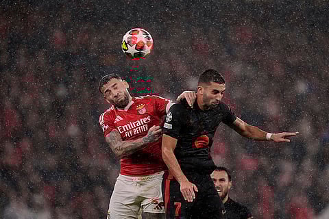 Champions League 2024–25: Nicolas Otamendi jumps for the ball against Ferran Torres