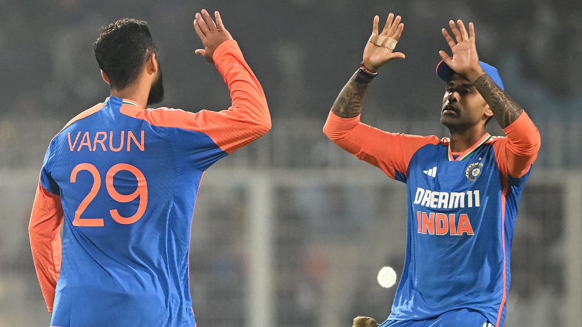 Varun (left) and Yadav celebrate